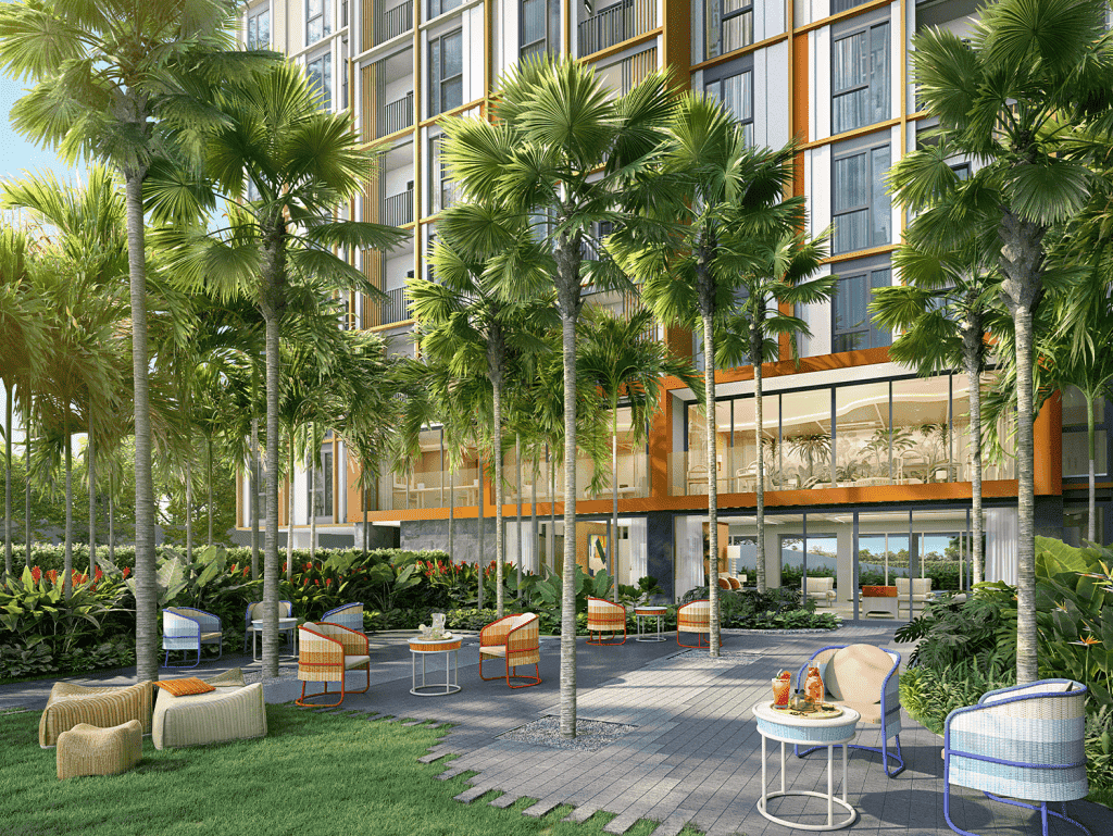 Modern Phuket hotel with lush garden and outdoor seating area for relaxation and leisure.