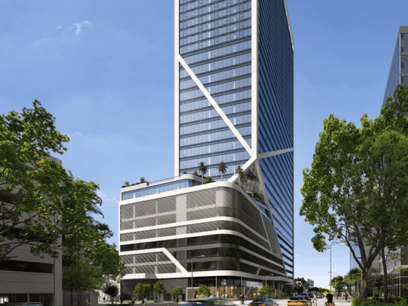 Modern Miami skyscraper with sleek glass facade and rooftop greenery.