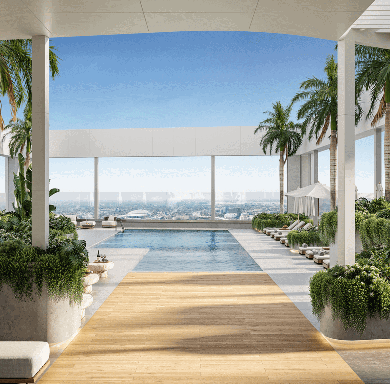 Luxury Miami residence with pool and ocean view, surrounded by palm trees and modern architecture.