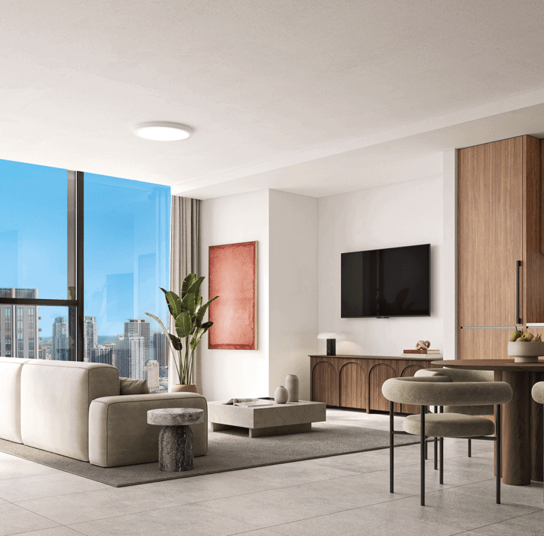 Modern Miami apartment interior with city skyline view and stylish furnishings.