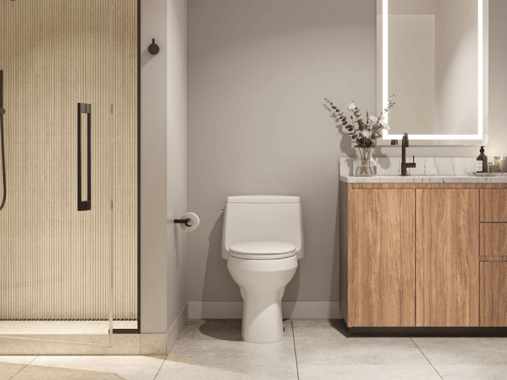 Miami Residences Bathroom Interior Modern bathroom with toilet and wooden vanity in Miami residence.