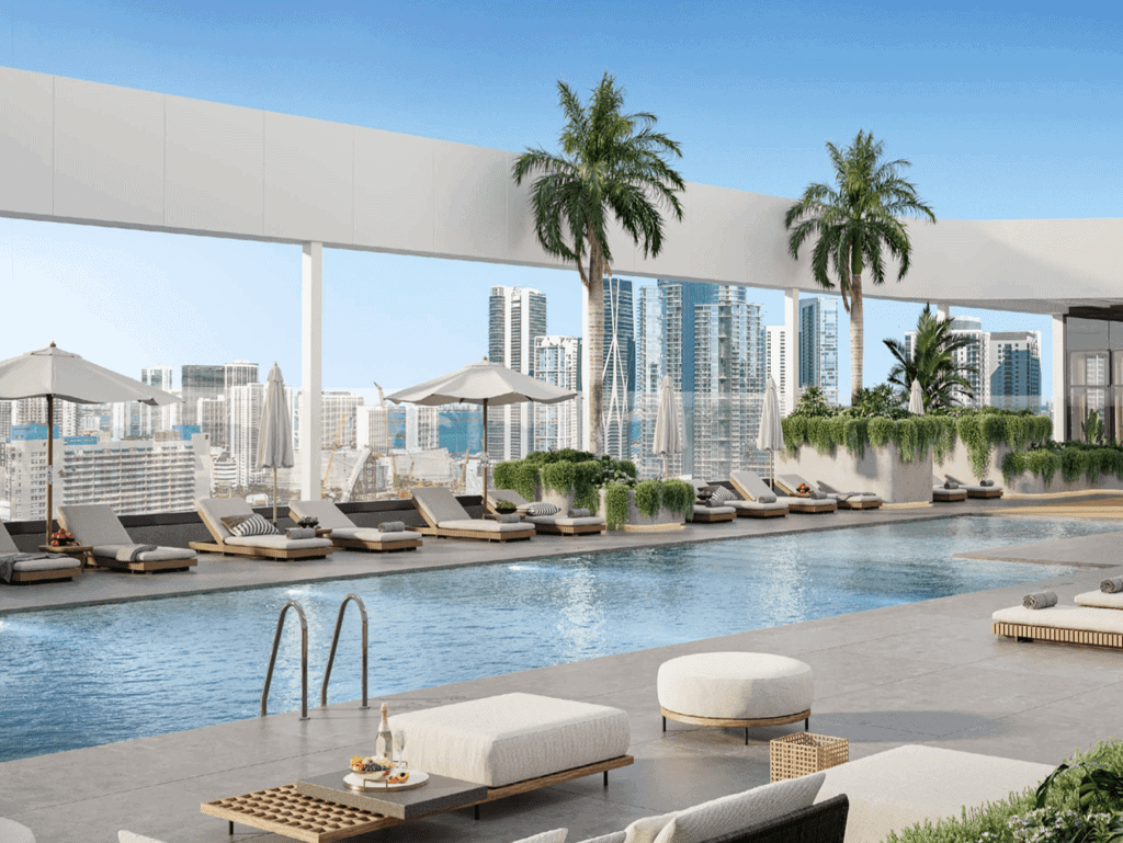 Luxury Miami rooftop pool with city skyline view and lounging area. Luxury Miami rooftop pool with city skyline view and lounging area.
