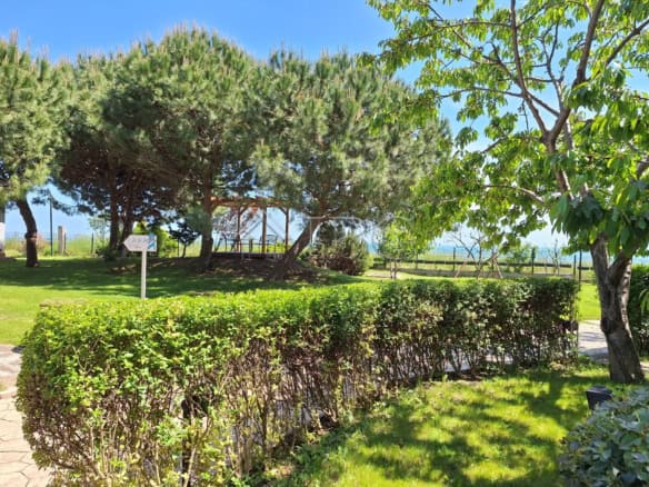 Spacious 2-bedroom apartment with private veranda overlooking marina and sea, located in Aheloy Beac.