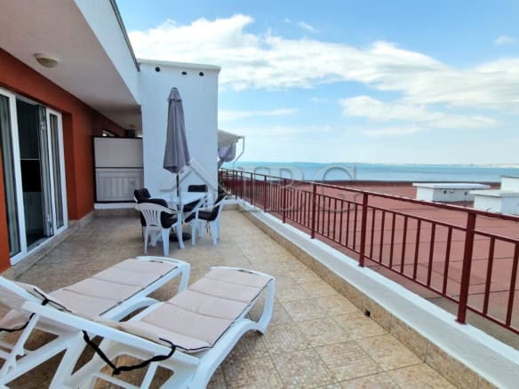 Bright terrace with sea and marina views in a renovated apartment at Fort Beach, Sveti Vlas.