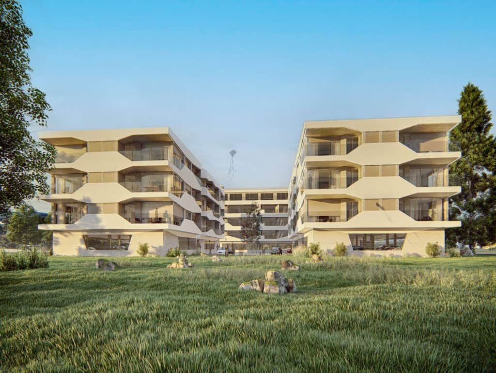 Modern apartment complex in Viana do Castelo, Portugal, with spacious balconies and lush green surro.
