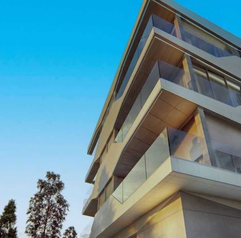 Contemporary apartment building in Viana do Castelo, Portugal with glass balconies.