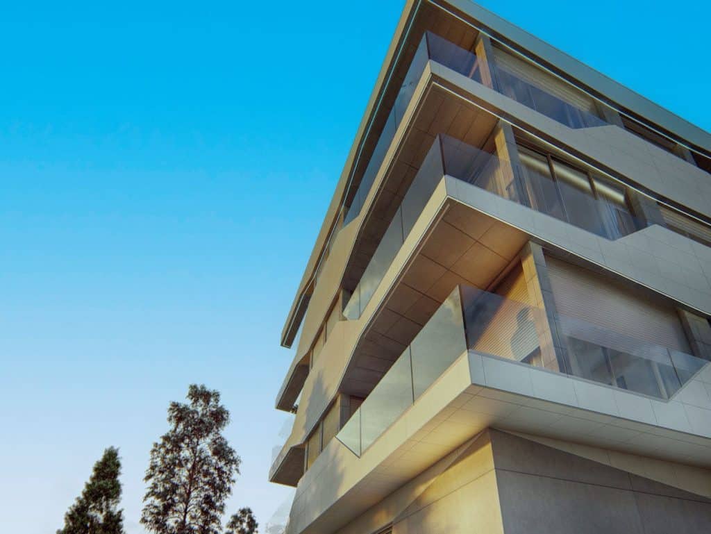 Contemporary apartment building in Viana do Castelo, Portugal with glass balconies.
