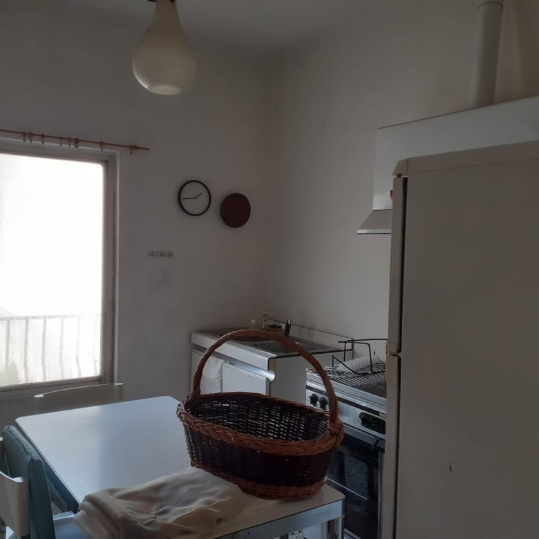 Interior view of a renovated 3-bed apartment kitchen in Calangianus, Sardinia, Italy.