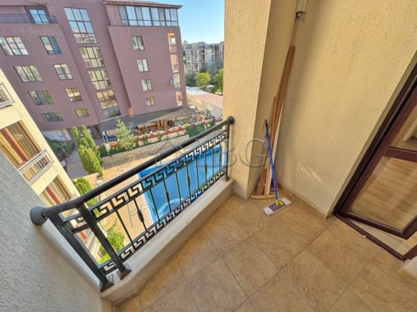 Cozy balcony with pool view in a bright 1-bedroom apartment at Camelot, Sunny Beach. Perfect for rel.