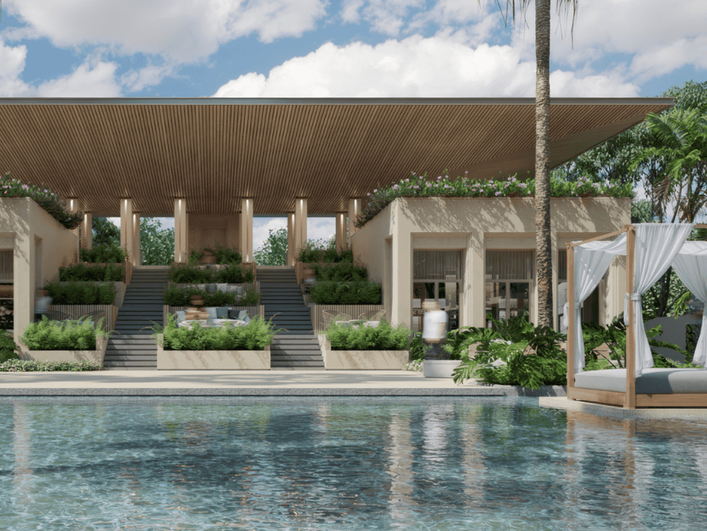 Luxury poolside lounge at Sudara, Phuket, Thailand, with modern architecture and lush greenery.