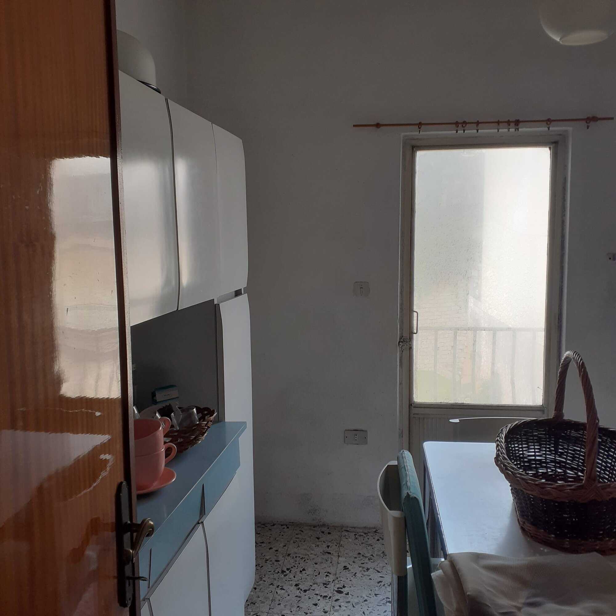 Bright interior of a renovated 3-bedroom apartment in Calangianus, Sardinia, Italy.