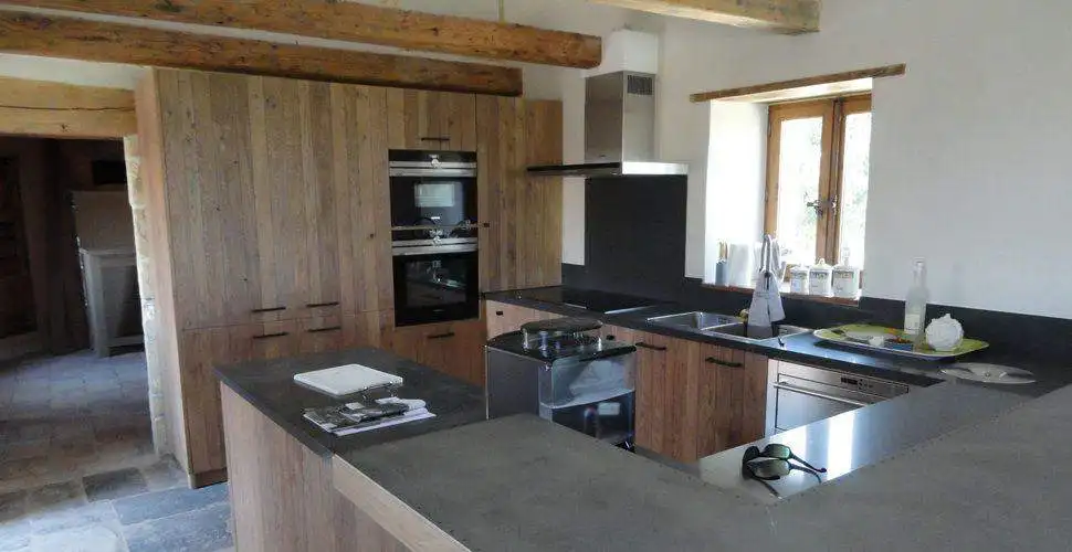 Elegant kitchen with modern appliances in the Goudargues estate.