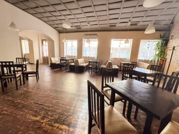 Charming restaurant interior with summer garden setup in the heart of Ruse city, perfect for dining.