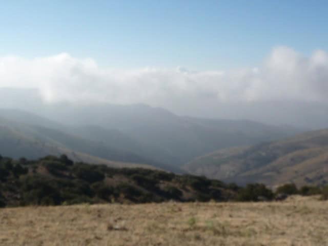 Country estate for sale in Caniles, Granada with scenic mountain views and rural tranquility.