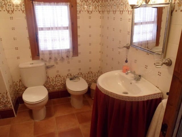 Charming bathroom in a traditional village property in Benamaurel, Granada.