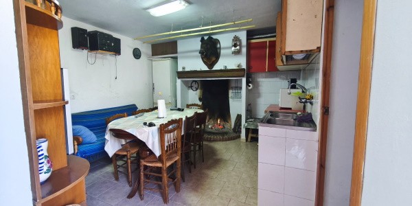 Charming village property in Cuenca, Jaen with traditional interior and cozy living space.