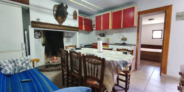 Charming village home in Cuenca, Jaen with traditional decor and cozy living spaces. Perfect for a p.