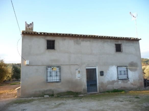 Charming village house in Huesa, Jaen, with traditional architecture and rural surroundings.