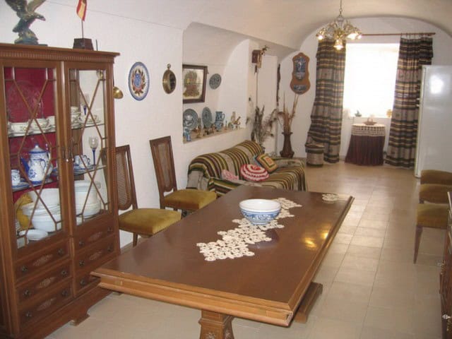 Charming farm property in Cullar, Granada, featuring a cozy interior with traditional decor and rust.