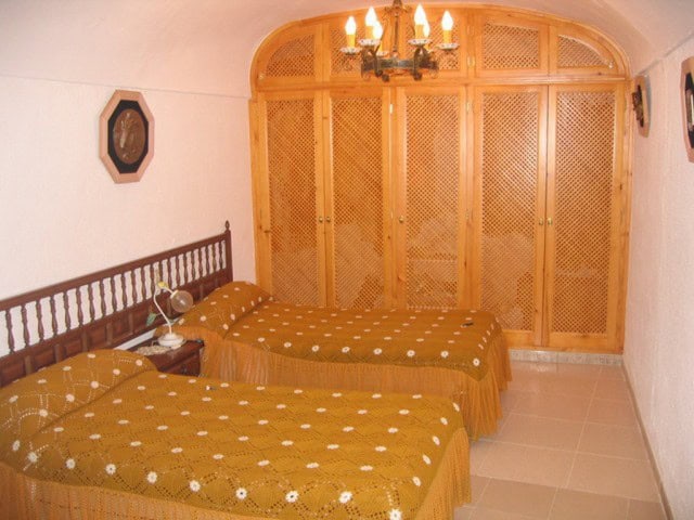 Farm Property in Cullar, Granada with rustic interior and traditional decor.