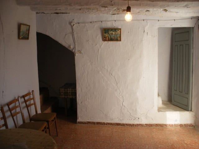 Interior of rural property in Velez Blanco, Almeria with white walls and rustic decor.