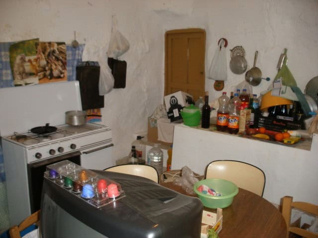 Charming rural home interior with a cozy kitchen and traditional decor in Velez Blanco, Almeria.