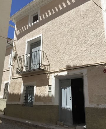 Charming village house in Orce, Granada with a small balcony and traditional architecture. Perfect f.