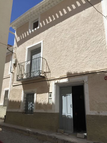 Charming village house in Orce, Granada with a small balcony and traditional architecture. Perfect f.