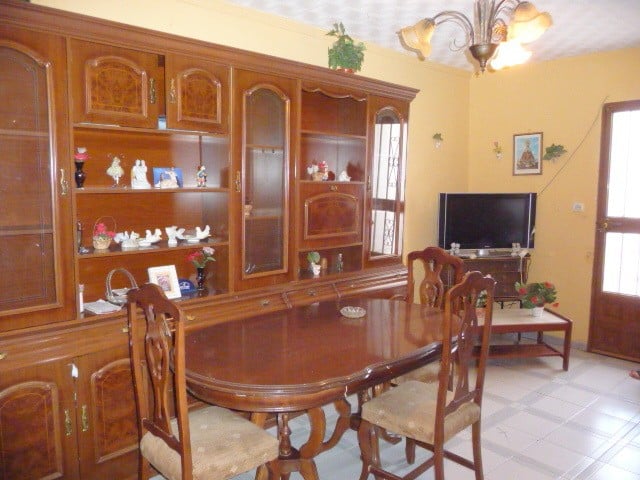 Village Property in Belerda, Jaen with traditional wooden furniture and cozy interior. Perfect for p.