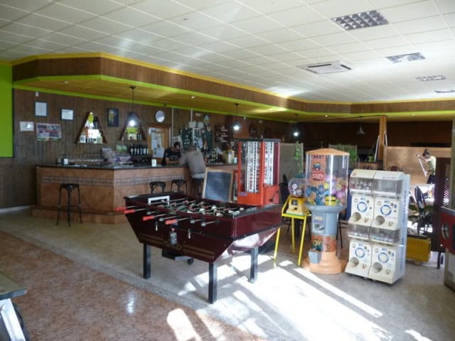 Commercial property in Benamaurel, Granada with gaming machines and a foosball table.
