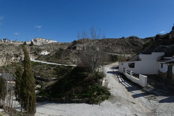 Cave house located in Galera, Granada, with scenic hillside views and traditional white exterior.