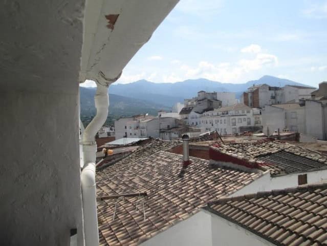 Village property with scenic mountain views in Quesada, Jaen. Traditional rooftops and charming surr.