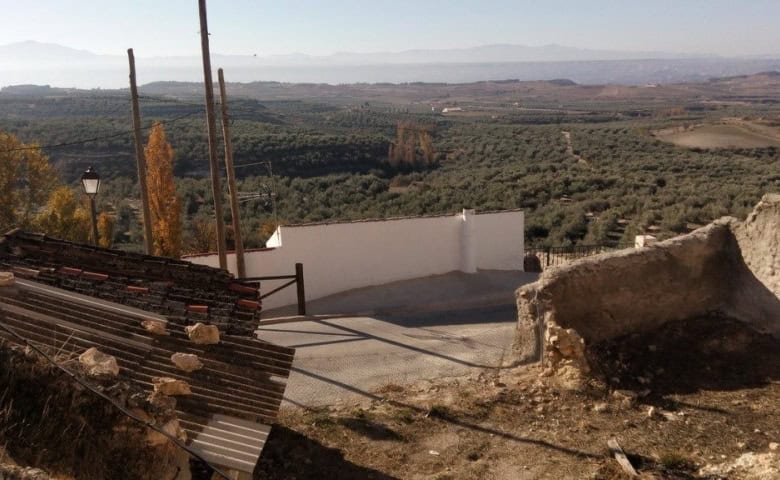 Ancient ruin in Cuevas del Campo with scenic views of Granada's landscape.