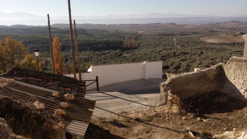Ancient ruin in Cuevas del Campo with scenic views of Granada's landscape.