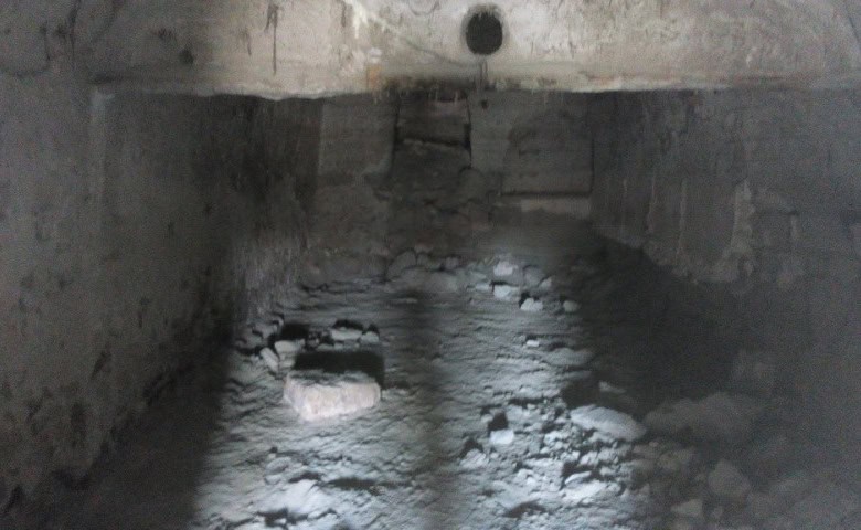 Cave house interior in La Alqueria, Granada, showcasing traditional stone walls and unique undergrou.