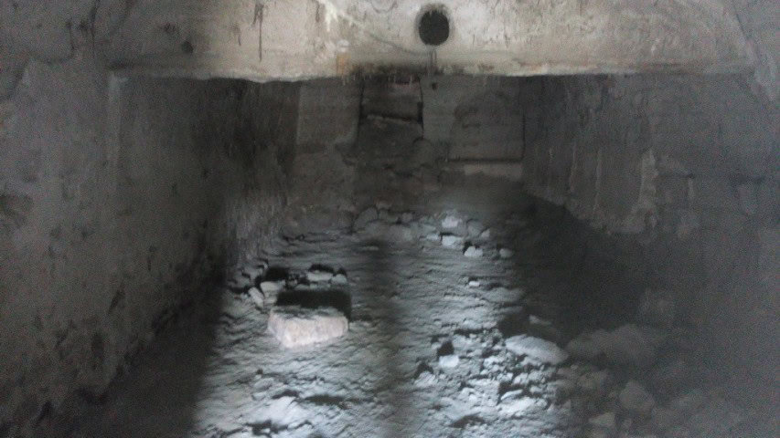 Cave house interior in La Alqueria, Granada, showcasing traditional stone walls and unique undergrou.