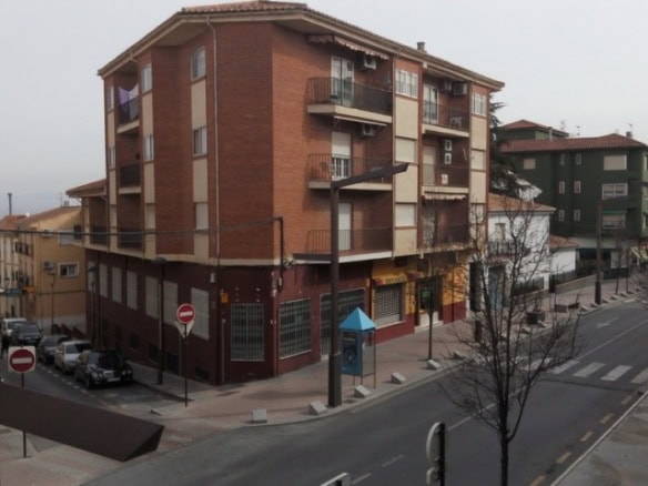 Apartment in Baza, Granada with modern amenities and city views.