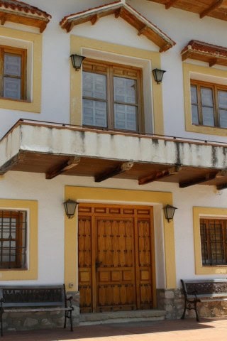 Traditional finca in Larva, Jaen with wooden balcony and rustic charm.