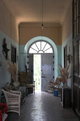Charming interior of a country estate in Larva, Jaen, showcasing rustic decor and vintage furniture.