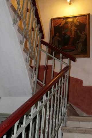 Elegant staircase inside a country estate in Larva, Jaen, showcasing traditional architecture and ar.