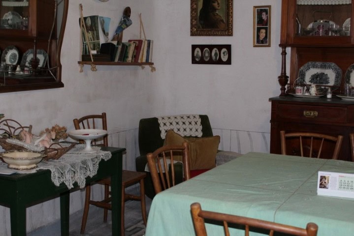 Charming interior of a traditional country estate in Larva, Jaen, featuring vintage furniture and cl.