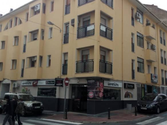 Apartment building in Baza, Granada, offering modern living spaces and convenient city location.