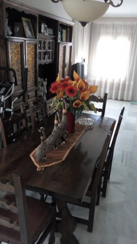 Apartment in Baza, Granada with a stylish dining area and elegant decor.