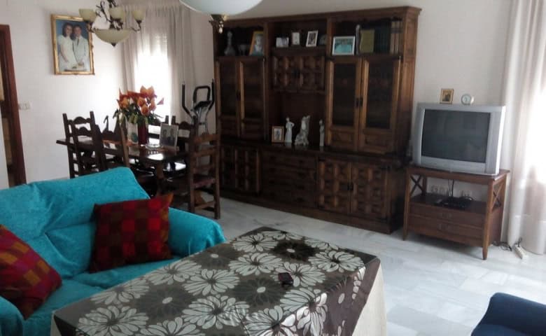 Apartment interior in Baza, Granada with living room and furniture.