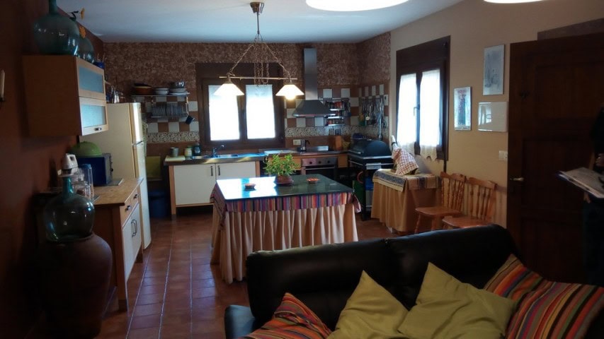 Cozy kitchen and living area in a rural Tijola property, featuring traditional decor and ample natur.
