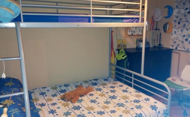 Beautiful rural property in Tijola, Almeria, featuring a cozy bedroom with a bunk bed and playful de.