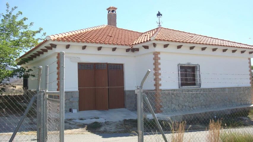 Rural property in Olula del Rio, Almeria featuring a charming traditional house with a tiled roof an.