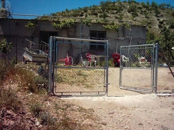 Farm property with a rustic building and outdoor space in Tijola, Almeria, ideal for agricultural or.