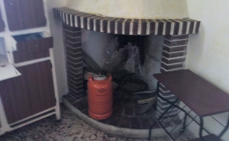 Bright fireplace in a traditional village home in Zujar, Granada.