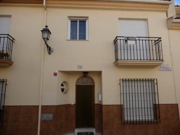 Charming village house in Zujar, Granada, with traditional architecture and modern amenities for com.